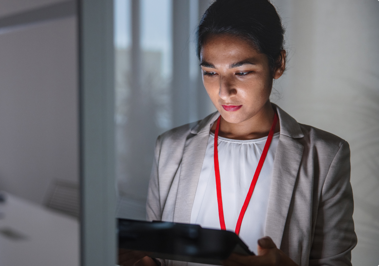 Indian Woman Using Digital Tablet In The Conference Room